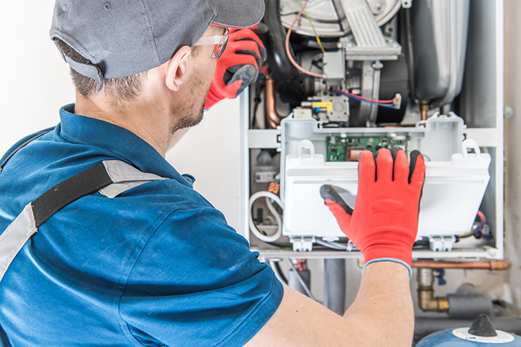 Image of a man repairing